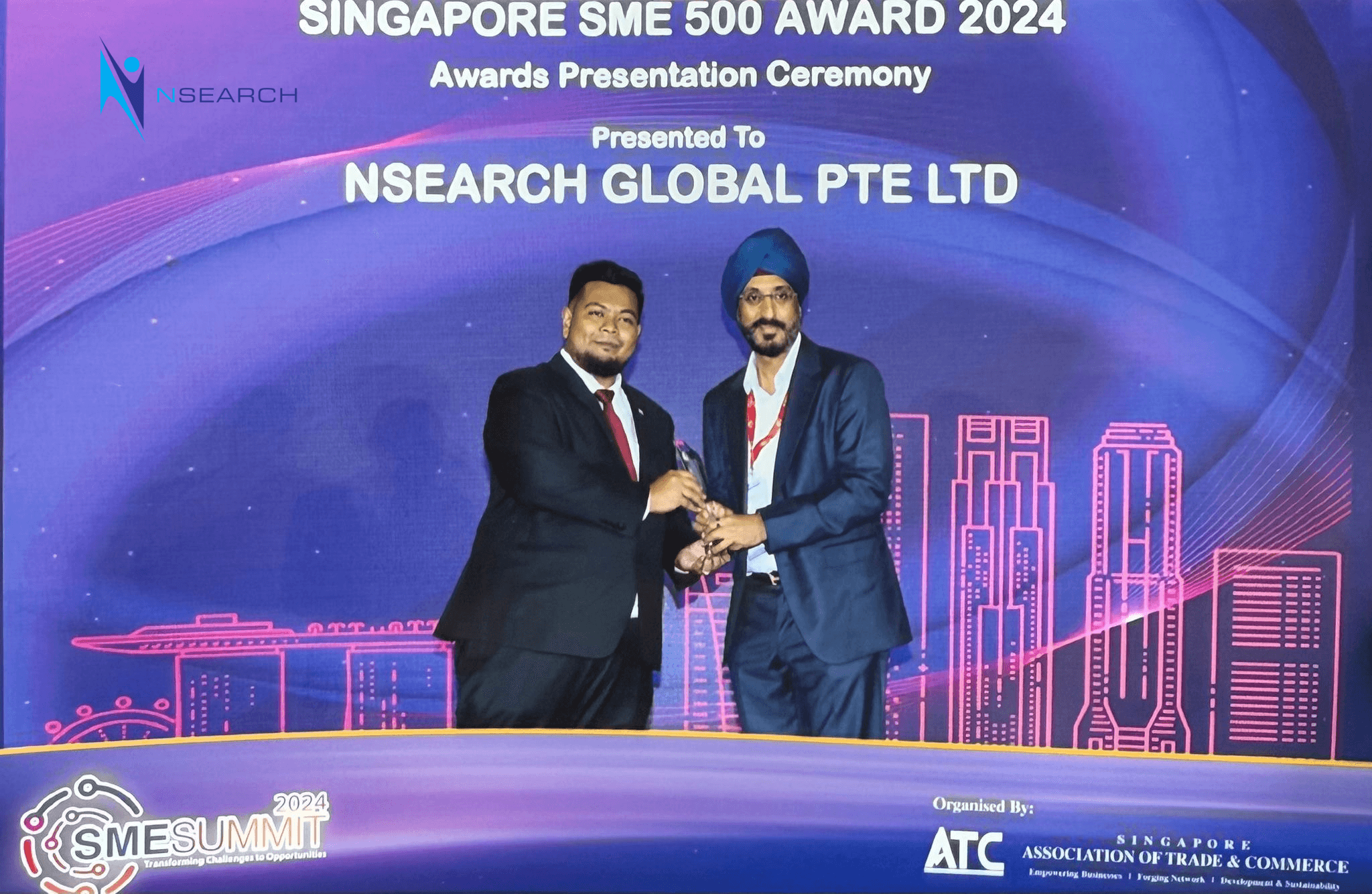 nSearch Global receives Singapore SME 500 Award 2024 at SME Summit – Managing Director Sanjit Singh Arora on stage