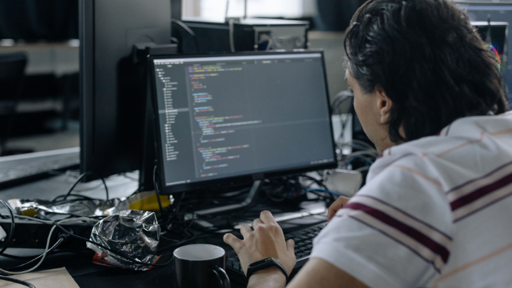 Engineer monitoring enterprise systems under a managed services model